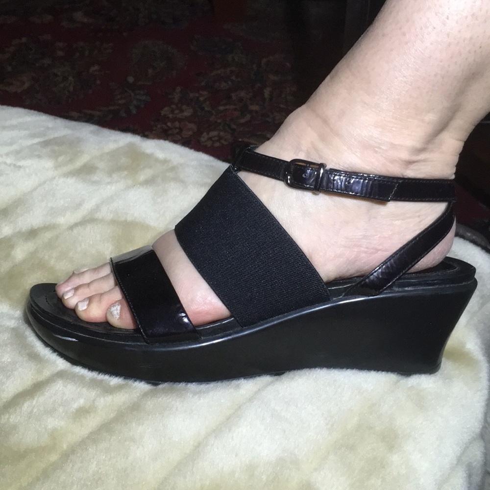 Dansko black wedge sandals.
